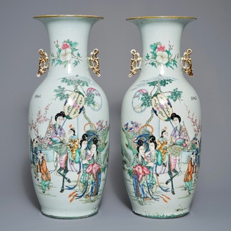 A pair of Chinese famille rose vases with figures in a garden, 19/20th C.