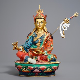 A Sino-Tibetan gilt and polychromed bronze figure of Padmasambhava, 20th C.