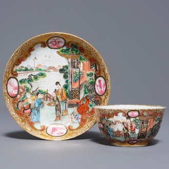 A fine Chinese famille rose 'mandarin' cup and saucer, Yongzheng/Qianlong