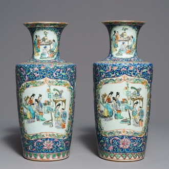 A pair of Chinese famille rose rouleau vases, 19th C.