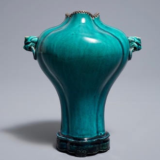 A Chinese monochrome turquoise-glazed vase on stand, 18th C.