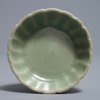 A small moulded Longquan celadon 'chrysanthemum' bowl, Song or Ming