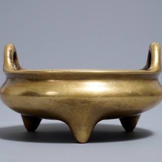 A Chinese bronze tripod censer, Xuande mark, 18th C.