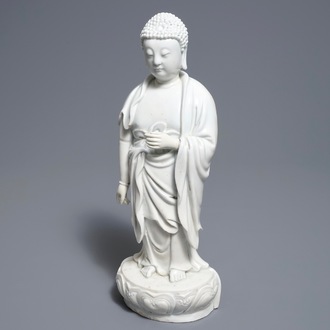 A Chinese Dehua blanc de Chine model of a standing Buddha, impressed mark on the back, Kangxi