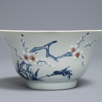 A Chinese blue, white and red on celadon ground 'prunus' bowl, Kangxi