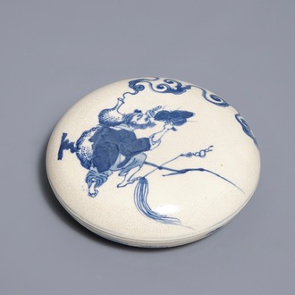 A Chinese blue and white seal paste box with the Immortal Li Tieguai, Kangxi mark, 19th. C.