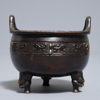 A Chinese bronze tripod incense burner, Xuande mark, 19th C.