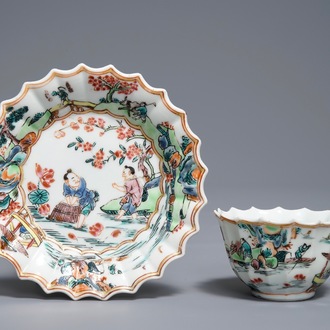 A Chinese famille rose cup and saucer with fishermen, Yongzheng