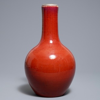 A Chinese monochrome oxblood-glazed bottle vase, 19th C.