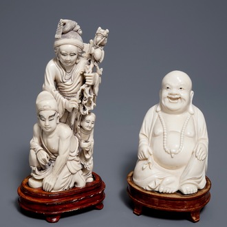 A Chinese ivory group of a family and a 'laughing Buddha' figure, ca. 1900