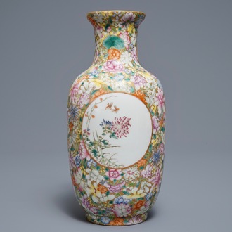 A Chinese famille rose millefleurs vase, Qianlong mark, 20th C.