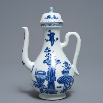 A Chinese blue and white ewer and cover with 'antiquities' design, Kangxi