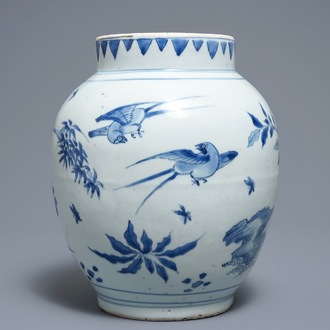 A Chinese blue and white jar with birds and flowers, Transitional period