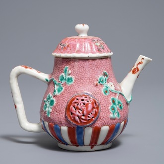 A Chinese famille rose relief-moulded teapot and cover, Yongzheng