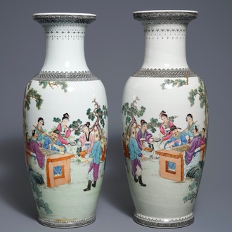 A pair of Chinese famille rose vases with figures in a garden, Qianlong mark, 20th C.