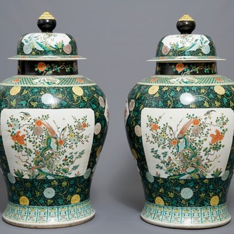 A pair of large Chinese famille noire vases and covers, 19/20th C.