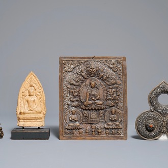 Two Tibetan votive plaques, a coral-inlaid silver amulet and a small bronze group, 18/19th C.