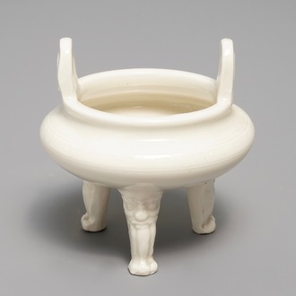 A Chinese Dehua blanc de Chine tripod censer, impressed seal mark, Kangxi