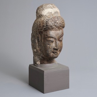 A Chinese carved limestone head of Buddha, Northern Wei (386-535)