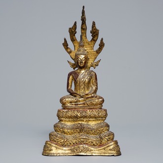 An inlaid gilt-lacquered bronze figure of Buddha, Burma, 19th C.