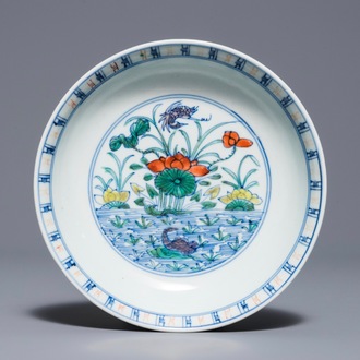 A Chinese doucai plate with ducks at a lotus pond, Yongzheng
