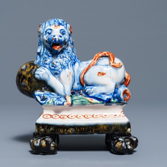 A polychrome Dutch Delft model of a lion, 19th C.