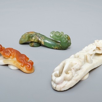 Three Chinese jade belt hooks, 19th C.