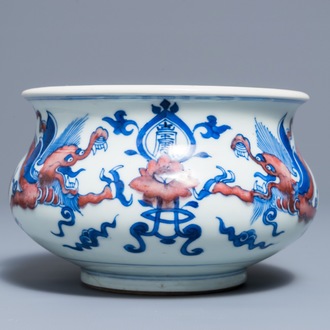 A rare Chinese blue, white and copper red 'dragon' censer, Kangxi