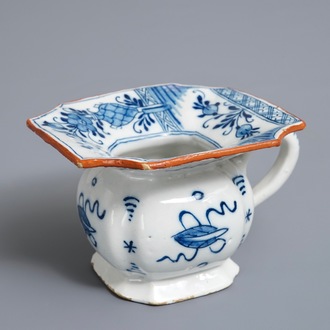 A Dutch Delft blue and white chinoiserie spittoon, 18th C.