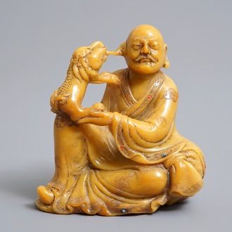 A Chinese inlaid Shoushan soapstone figure of a Luohan, 19/20th C.