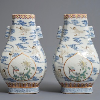 A pair of Chinese famille rose fanghu vases with cranes, Qianlong marks, 19/20th C.