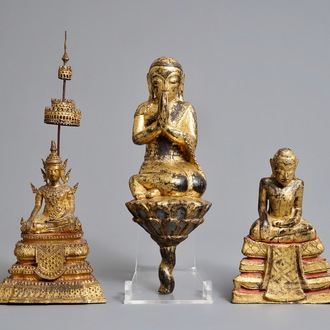 Three Thai gilt bronze, earthenware and wooden votive figures, 19th C.