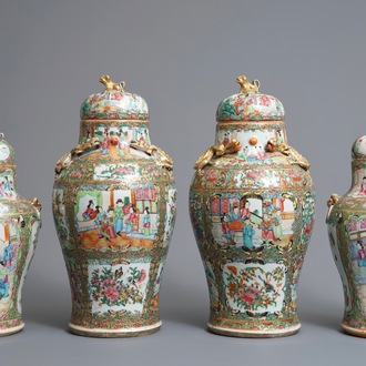 Two pairs of Chinese Canton famille rose vases and covers, 19th C.