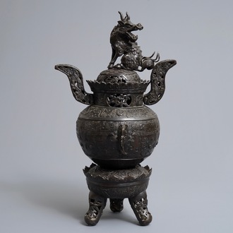 A large Chinese bronze tripod censer with qilin cover, 19/20th C.