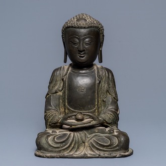 A Chinese bronze model of Amithaba Buddha, Ming