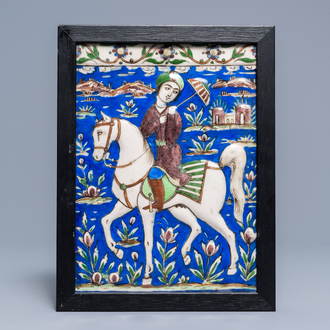 Un carreau rectangulaire à décor d'un prince sur cheval, art qajar, Iran, 19ème