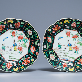 A pair of Chinese famille noire plates, Yongzheng