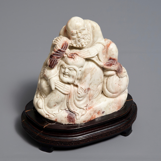 A Chinese Shoushan soapstone 'immortals' group, 19th C.