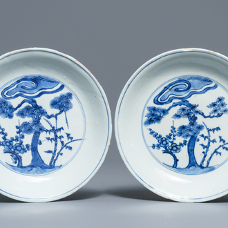 A pair of Chinese blue and white 'Three friends of winter' plates, Chenghua mark, Wanli