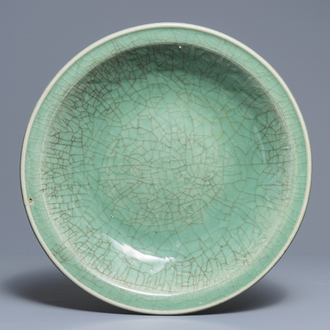 A large Chinese Zhejiang celadon-green charger, Ming