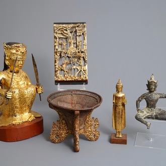 A varied collection of gilt wood carvings, a basket and a bronze figure, China and Southeast Asia, 19/20th C.