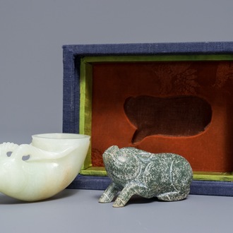 A Chinese jade deer rhyton cup and a spinach green jade pig, Han or later