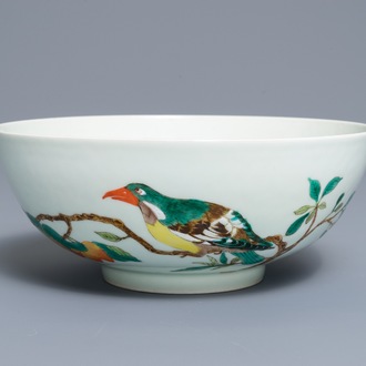 A Chinese famille verte 'birds on peach branches' bowl, Kangxi mark, 19th C.