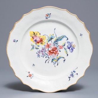 A polychrome Tournai faience 'flower bouquet' plate, 18th C.