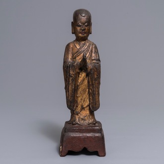 A Chinese lacquered and gilt bronze figure of Mahakasyapa, Ming