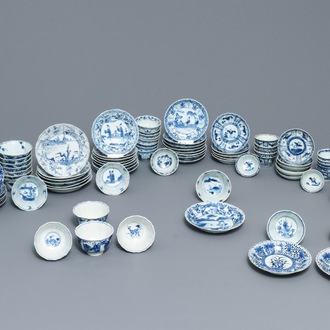 A large collection of Chinese blue and white cups and saucers, Kangxi and later