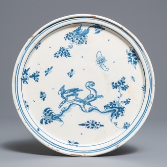 An Alcora faience blue and white tazza with birds and insects, Spain, 18th C.