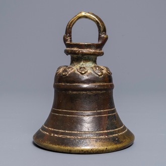 A Sino-Tibetan bronze bell with traces of lacquer and gilding, 17/18th C.