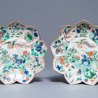 A pair of Chinese famille verte lotus-shaped plates, Kangxi