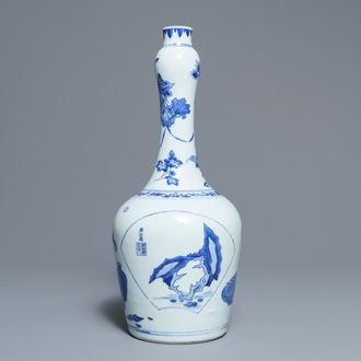 A Chinese blue and white bottle vase with inscription, Transitional period